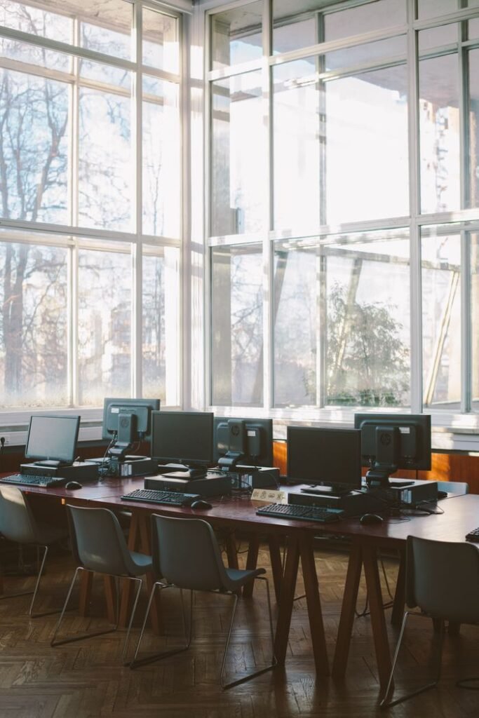 Sunlit computer lab with contemporary design and multiple workstations